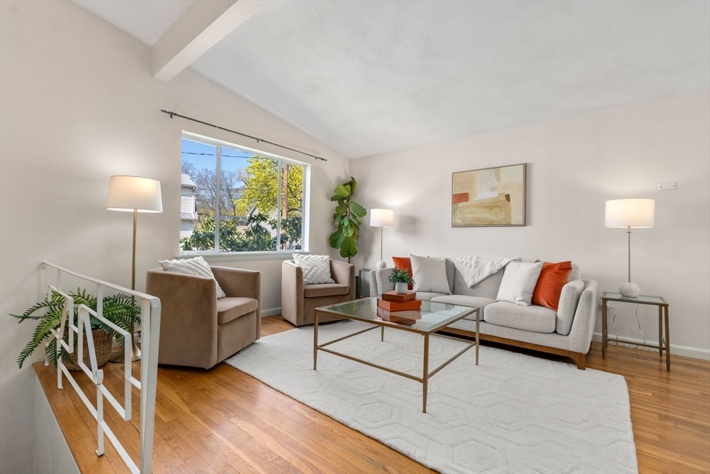 14 Fuller Avenue Newton, MA 02465 - Photo 12 of 27 a living room with furniture and a lamp