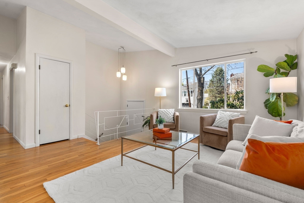 14 Fuller Avenue Newton, MA 02465 - Photo 15 of 27 a living room with furniture and a wooden floor