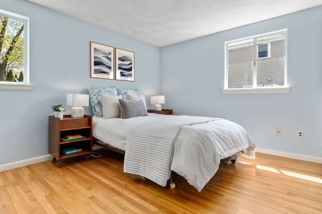 14 Fuller Avenue Newton, MA 02465 - Photo 16 of 27 a bedroom with a bed and a desk