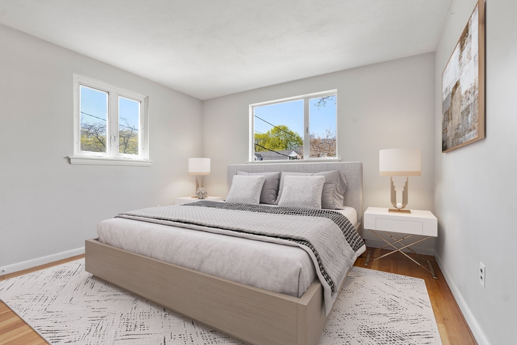 14 Fuller Avenue Newton, MA 02465 - Photo 19 of 27 a bedroom with bed and a window