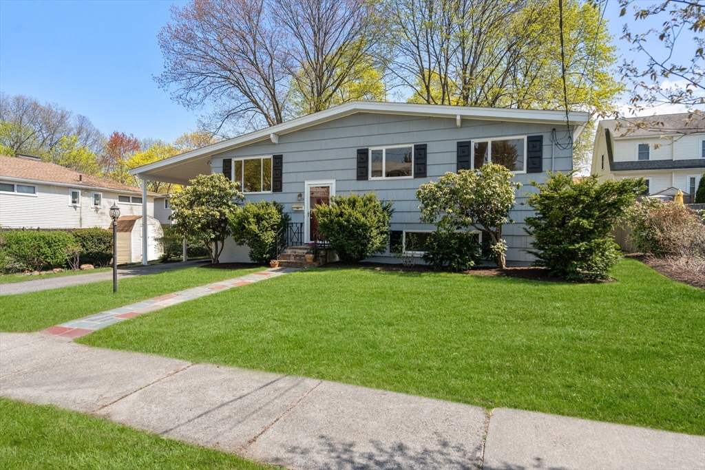 14 Fuller Avenue Newton, MA 02465 - Photo 2 of 27 a front view of a house with a garden