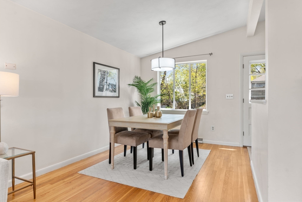 14 Fuller Avenue Newton, MA 02465 - Photo 5 of 27 a view of a dining room with furniture window and wooden floor