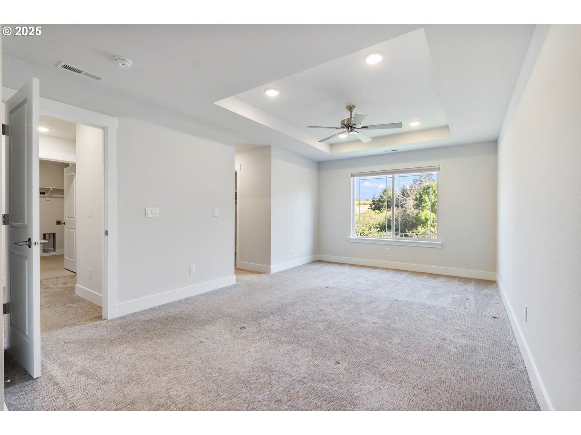 18246 Southwest Silvertip Street Beaverton, OR 97007 - Photo 19 of 46 a view of an empty room with a window