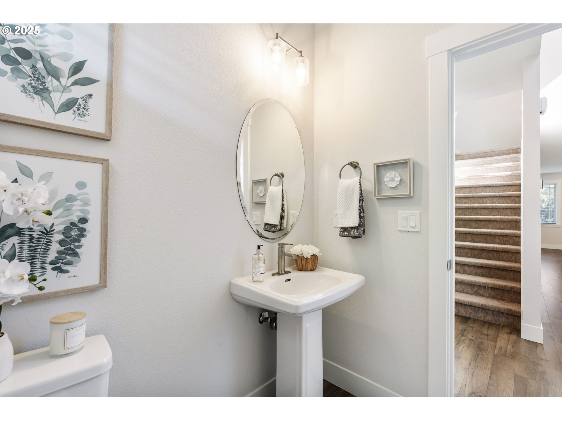 18246 Southwest Silvertip Street Beaverton, OR 97007 - Photo 30 of 46 a bathroom with a sink and a mirror