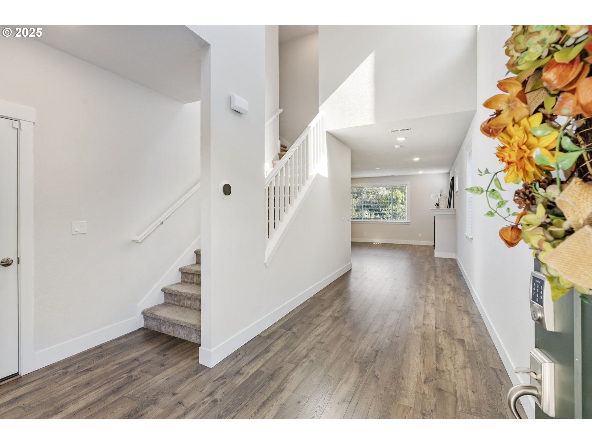 18246 Southwest Silvertip Street Beaverton, OR 97007 - Photo 6 of 46 a view interior of house with wooden floor