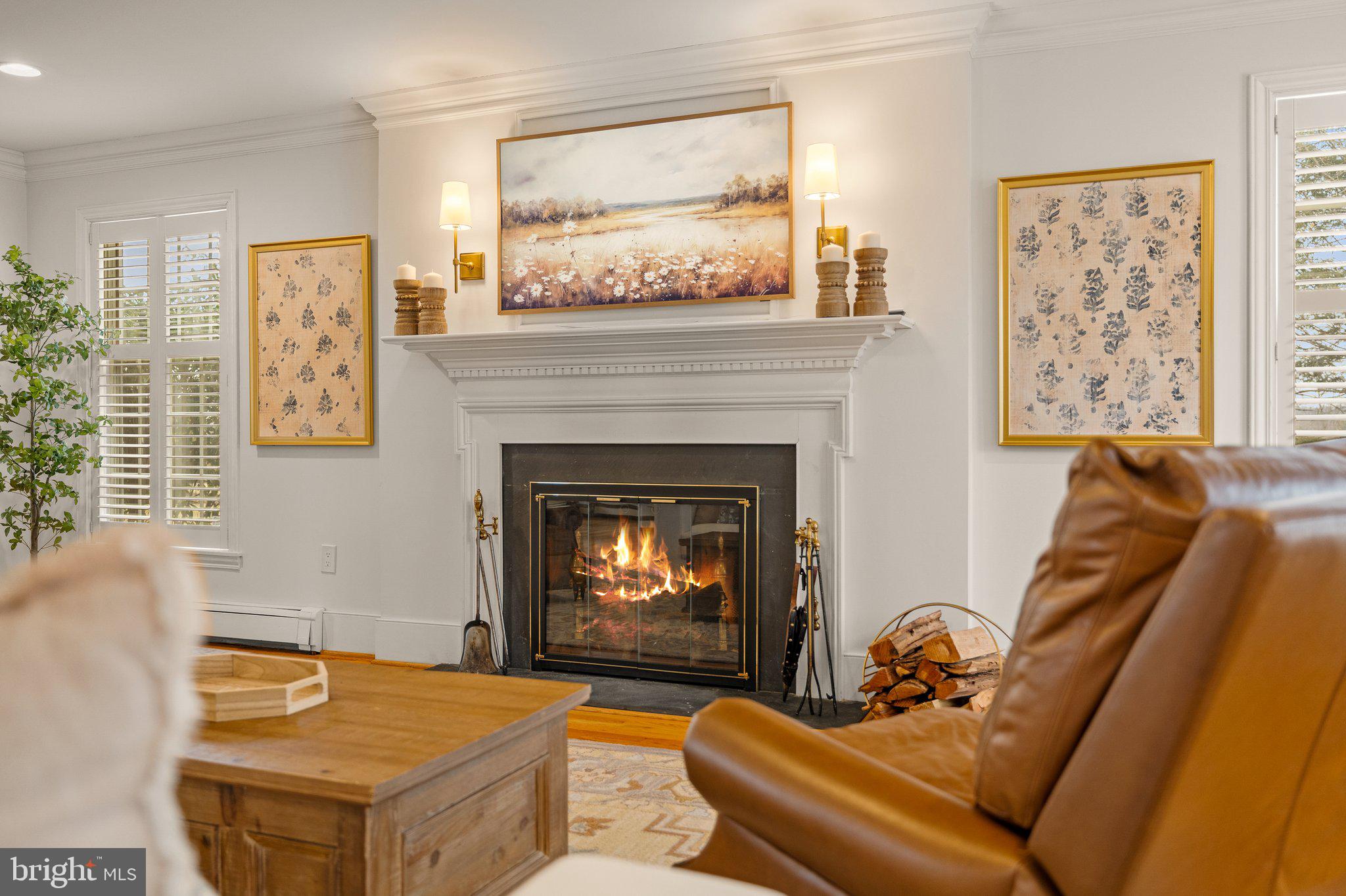 1323 Gypsy Hill Road Lower Gwynedd, PA 19002 - Photo 15 of 51 a living room with furniture and a fireplace