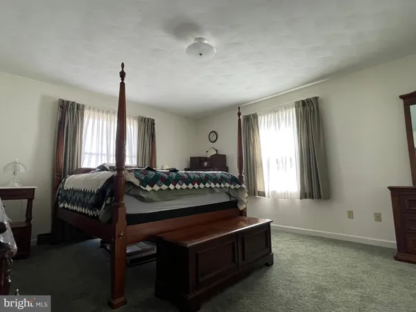 a bathroom with a shower and toilet