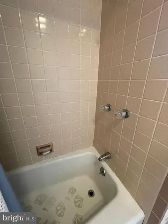 a view of room with gym equipment