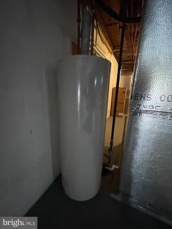 a view of a field with trees in front of it