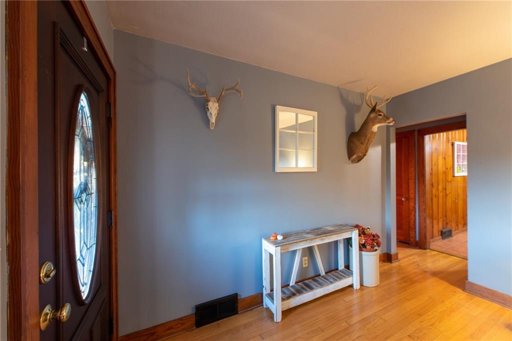 250 Rhoda Avenue Leechburg, PA 15656 - Photo 4 of 38 a living room with a baby crib furniture and a window