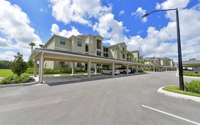 a front view of a building with street view