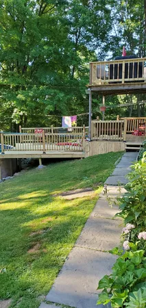 a view of a deck with a yard