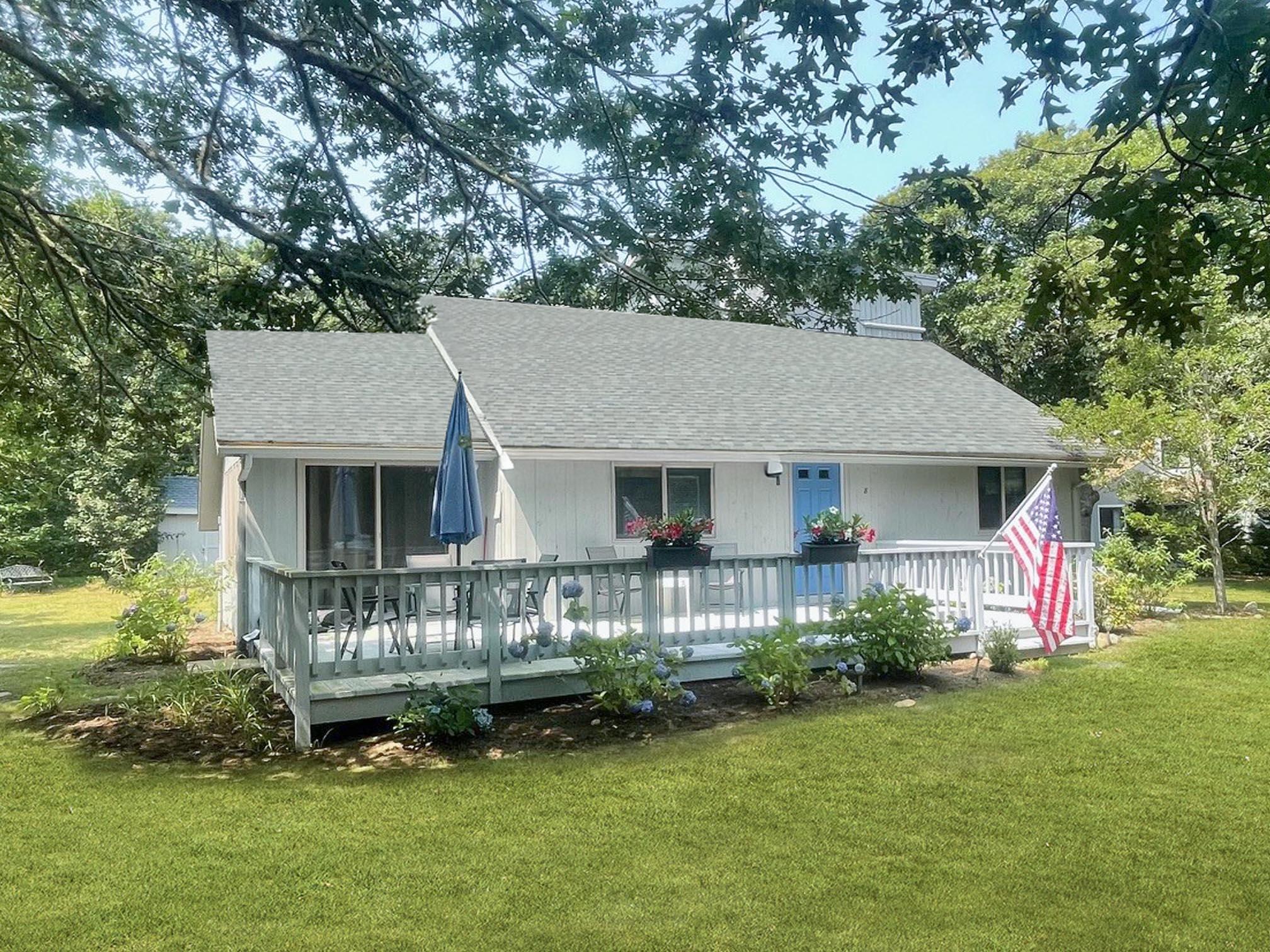 8 Court Street Edgartown, MA 02539 - Photo 1 of 17 a view of house with yard and outdoor seating