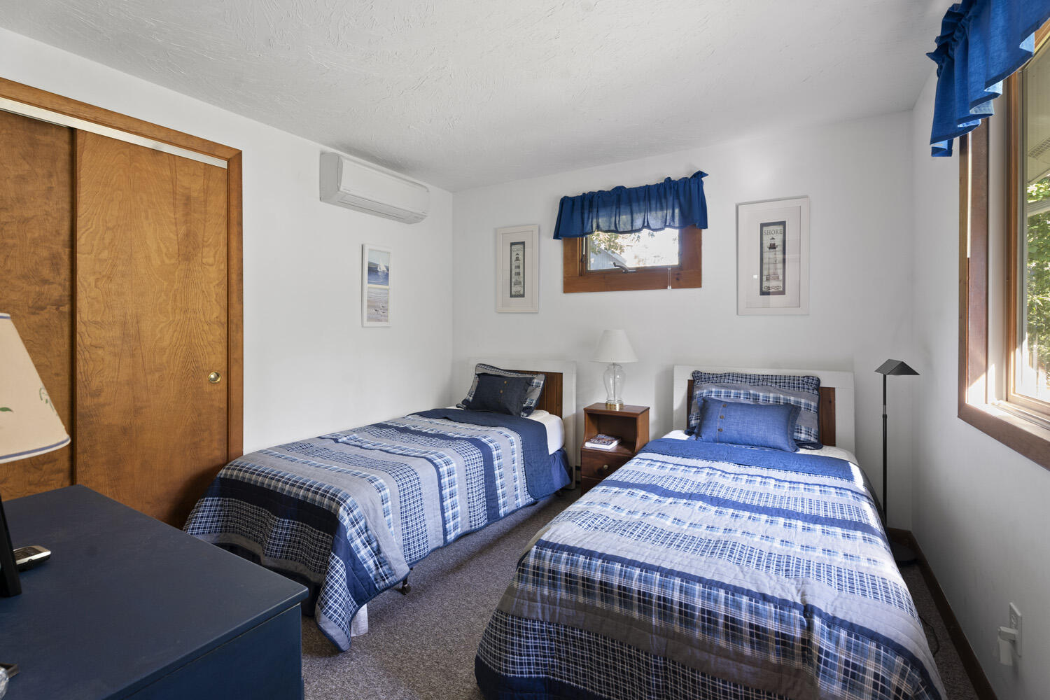 8 Court Street Edgartown, MA 02539 - Photo 11 of 17 a bedroom with two beds and a window