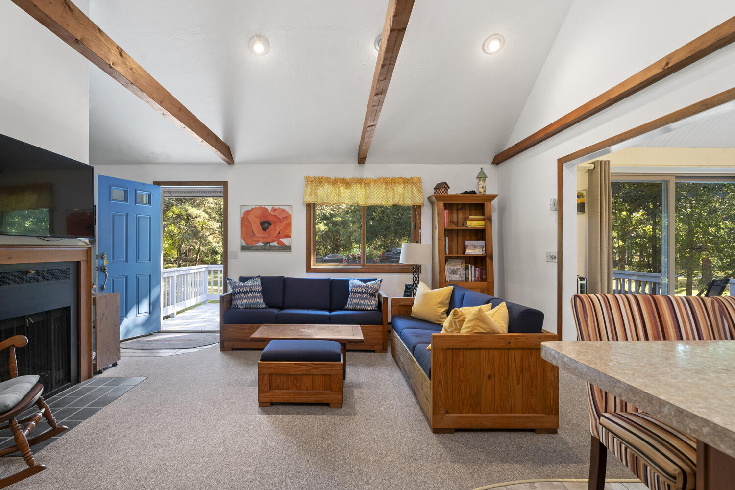 8 Court Street Edgartown, MA 02539 - Photo 2 of 17 a living room with furniture a flat screen tv and a fireplace