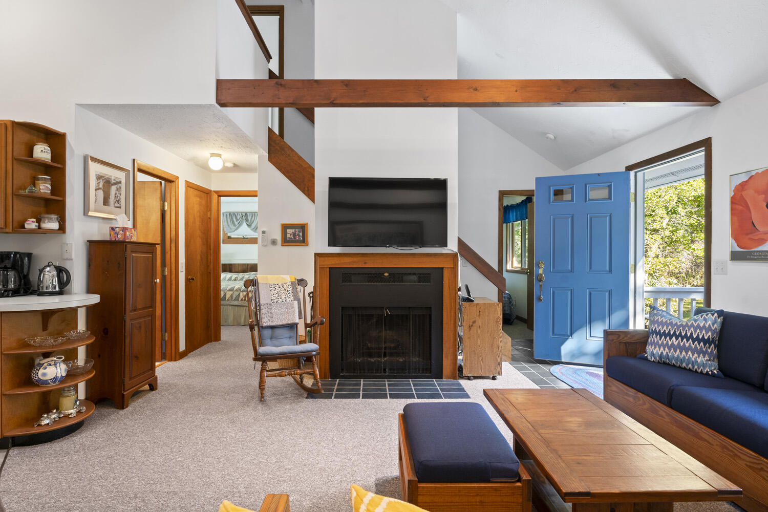 8 Court Street Edgartown, MA 02539 - Photo 3 of 17 a living room with furniture and a fireplace