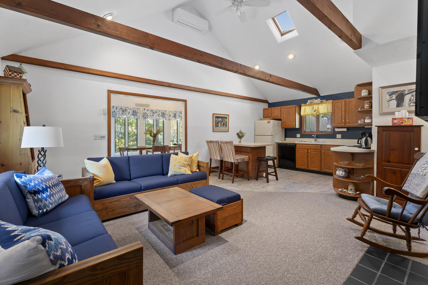 8 Court Street Edgartown, MA 02539 - Photo 4 of 17 a living room with furniture kitchen view and a large window