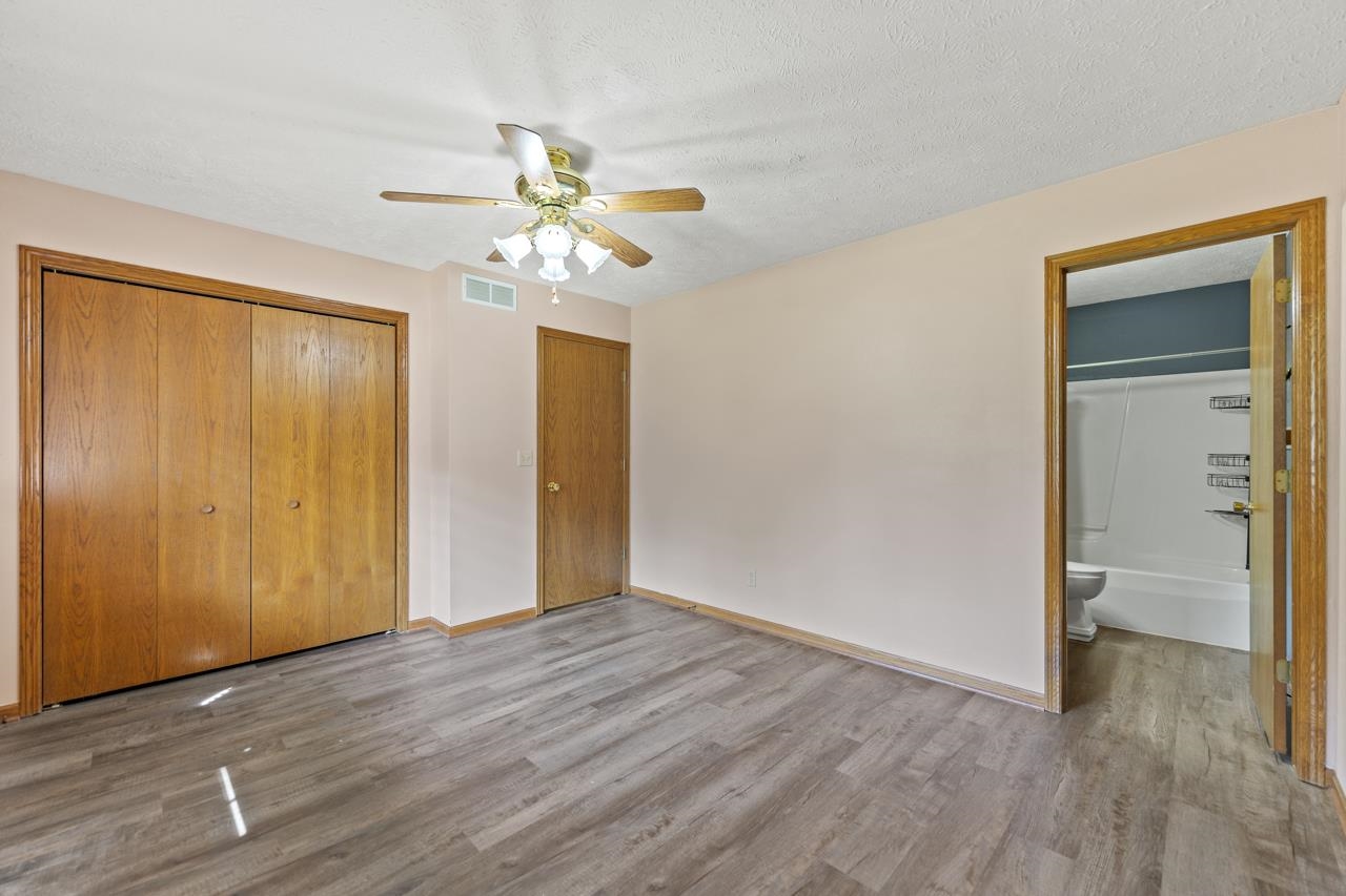 1726 Baintree Road Lake Summerset, IL 61019 - Photo 15 of 39 a view of an empty room with wooden floor