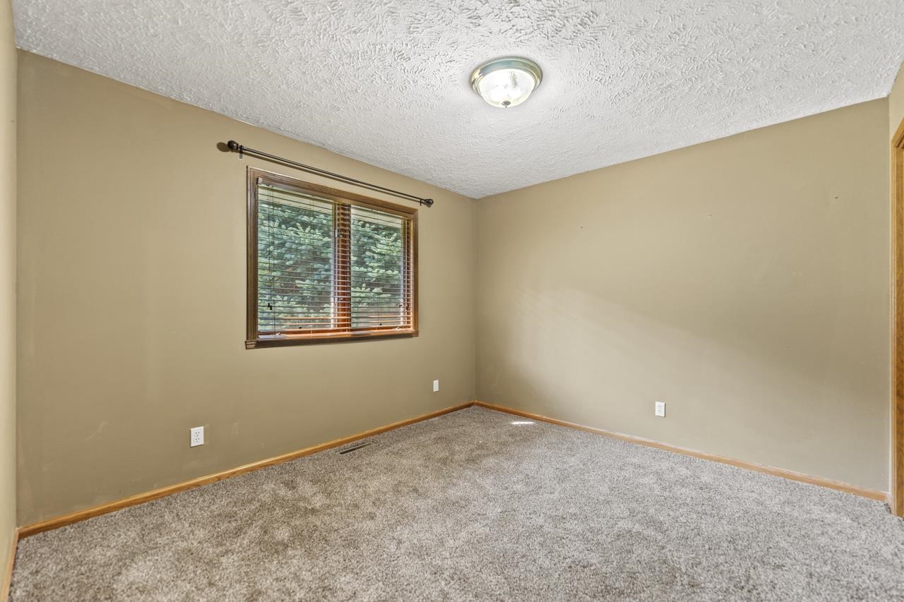 1726 Baintree Road Lake Summerset, IL 61019 - Photo 17 of 39 an empty room with windows