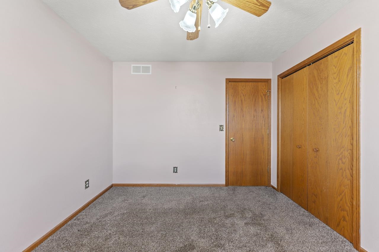1726 Baintree Road Lake Summerset, IL 61019 - Photo 21 of 39 a view of an empty room with a window
