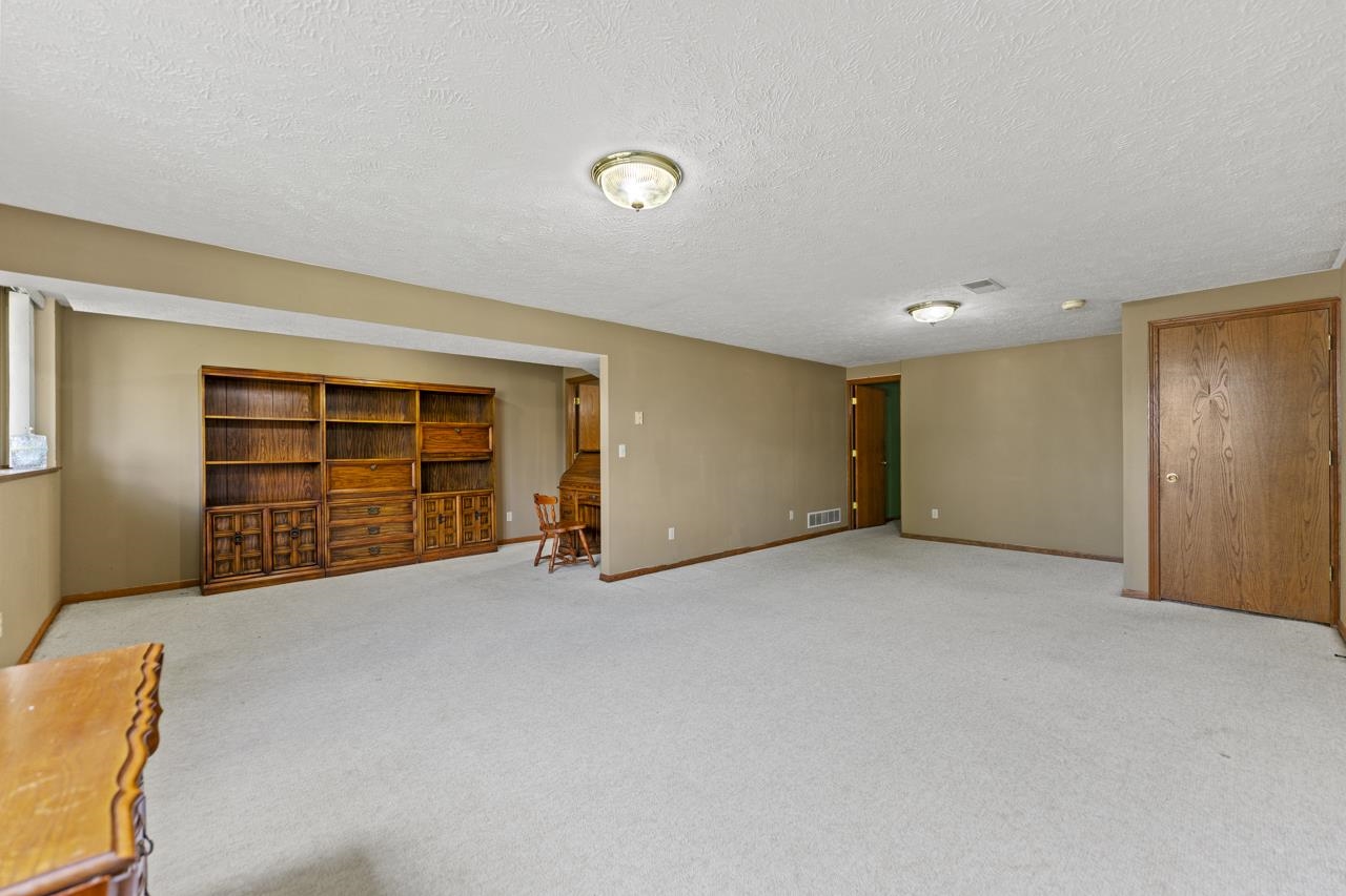 1726 Baintree Road Lake Summerset, IL 61019 - Photo 22 of 39 a view of an empty room with a window