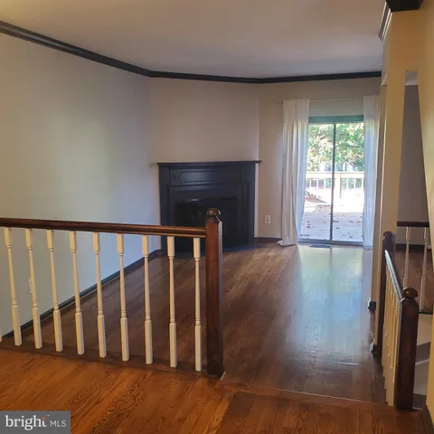 a view of entryway with wooden floor