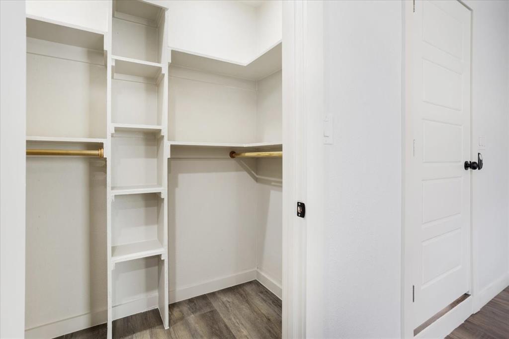 110 East Cunningham Street Bonham, TX 75418 - Photo 13 of 26 a view of an empty walk in closet