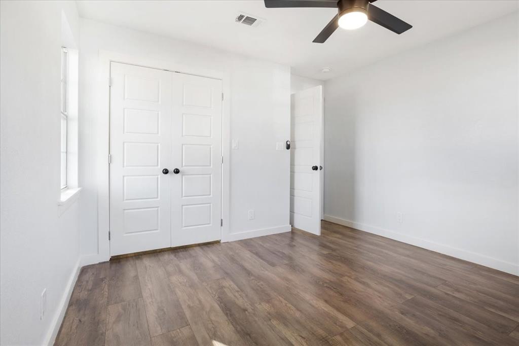 110 East Cunningham Street Bonham, TX 75418 - Photo 17 of 26 wooden floor in an empty room