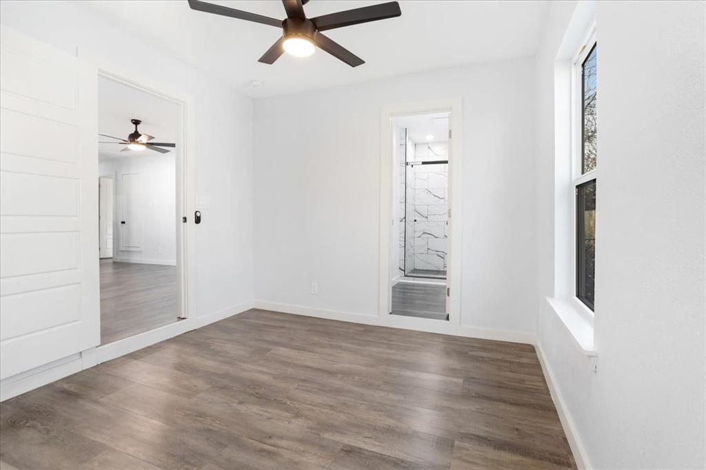 110 East Cunningham Street Bonham, TX 75418 - Photo 9 of 26 wooden floor in an empty room