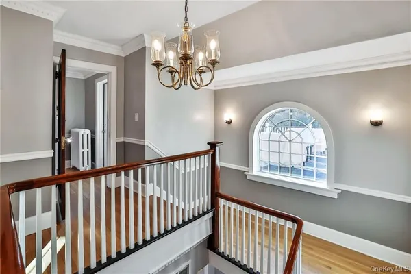 a view of an entryway wooden floor