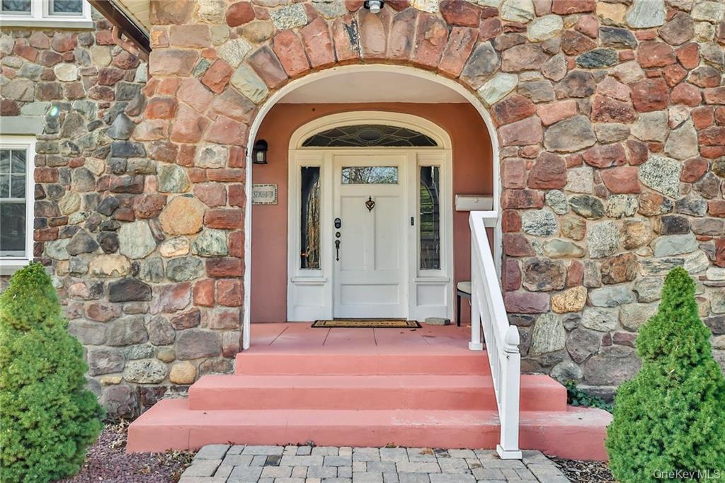 245 Townline Road West Nyack, NY 10994 - Photo 2 of 30 a front view of a house with a garden