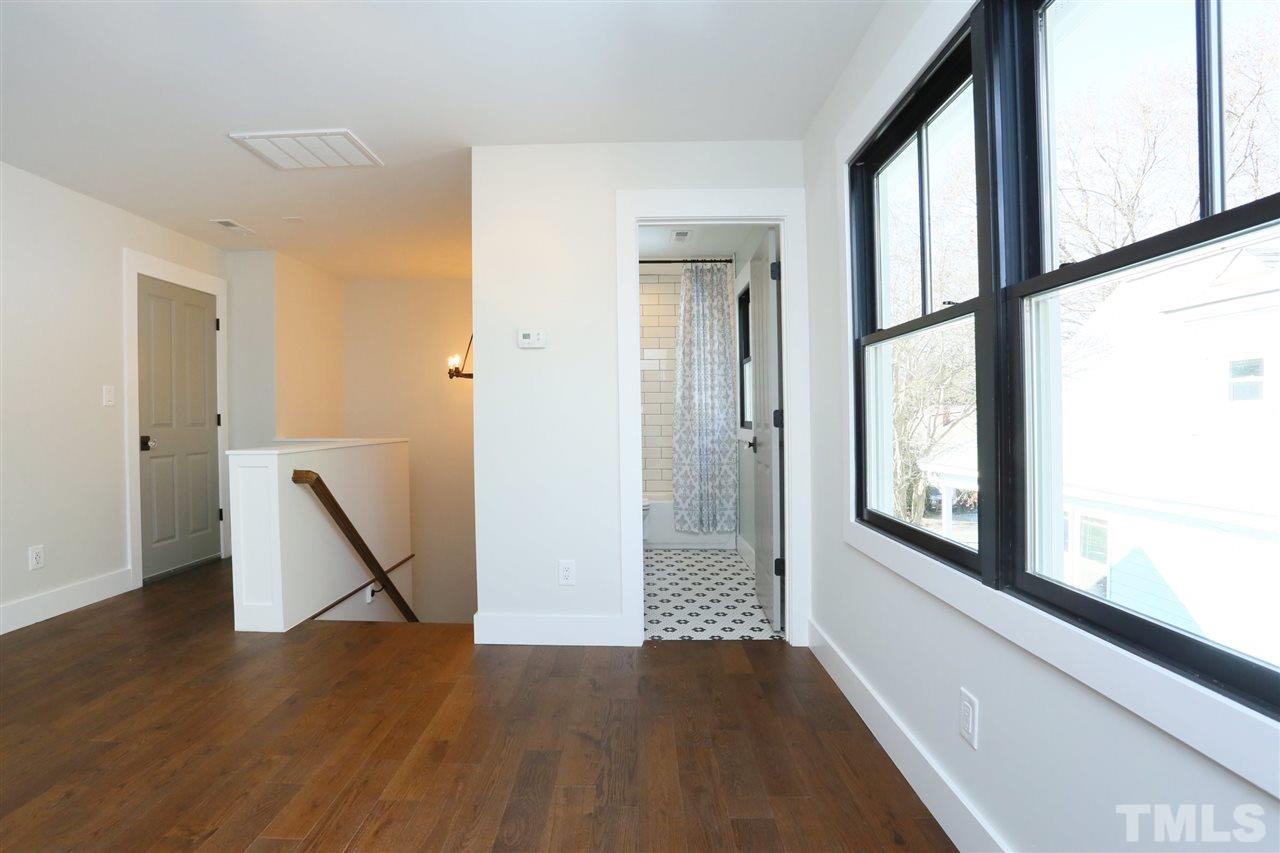 1007 South Person Street Raleigh, NC 27601 - Photo 20 of 25 3rd full bath, walk-in attic storage
