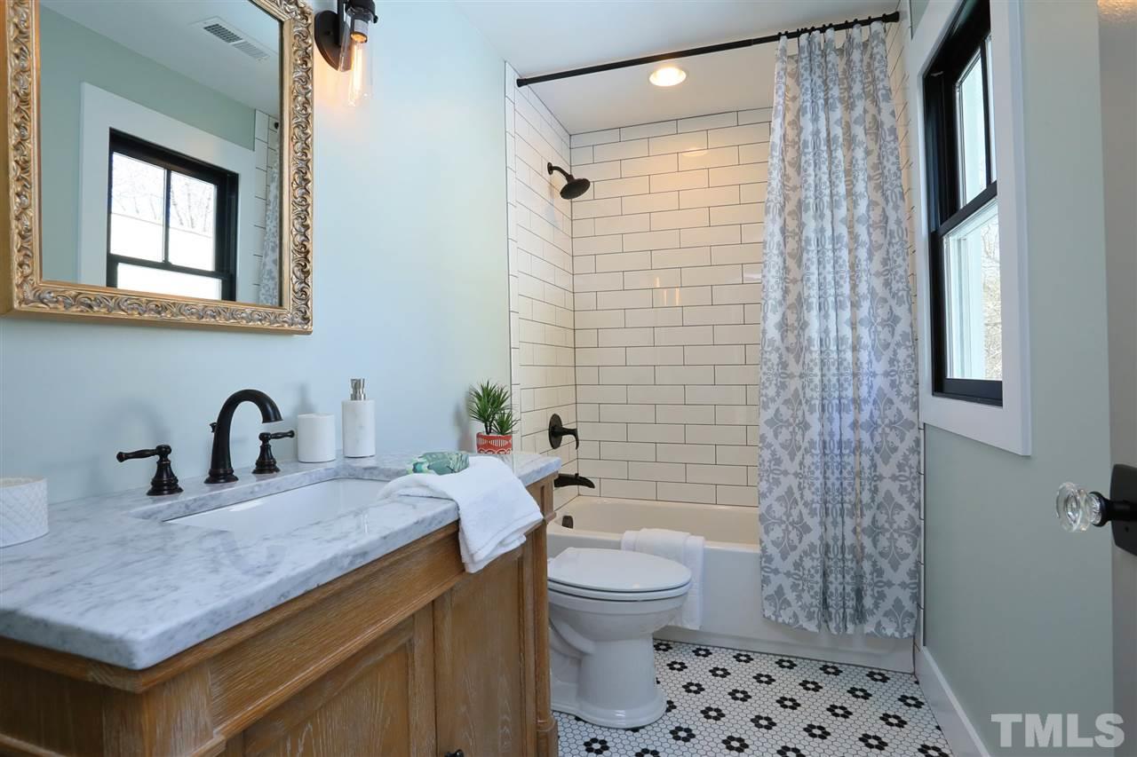 1007 South Person Street Raleigh, NC 27601 - Photo 21 of 25 The second level has a 3rd full bath.