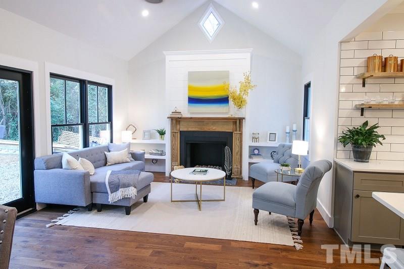 1007 South Person Street Raleigh, NC 27601 - Photo 6 of 25 This is where your best life takes place! Open concept kitchen, living and dining room are perfect for entertaining and conversation. Great flow right onto your deck and HUGE backyard.