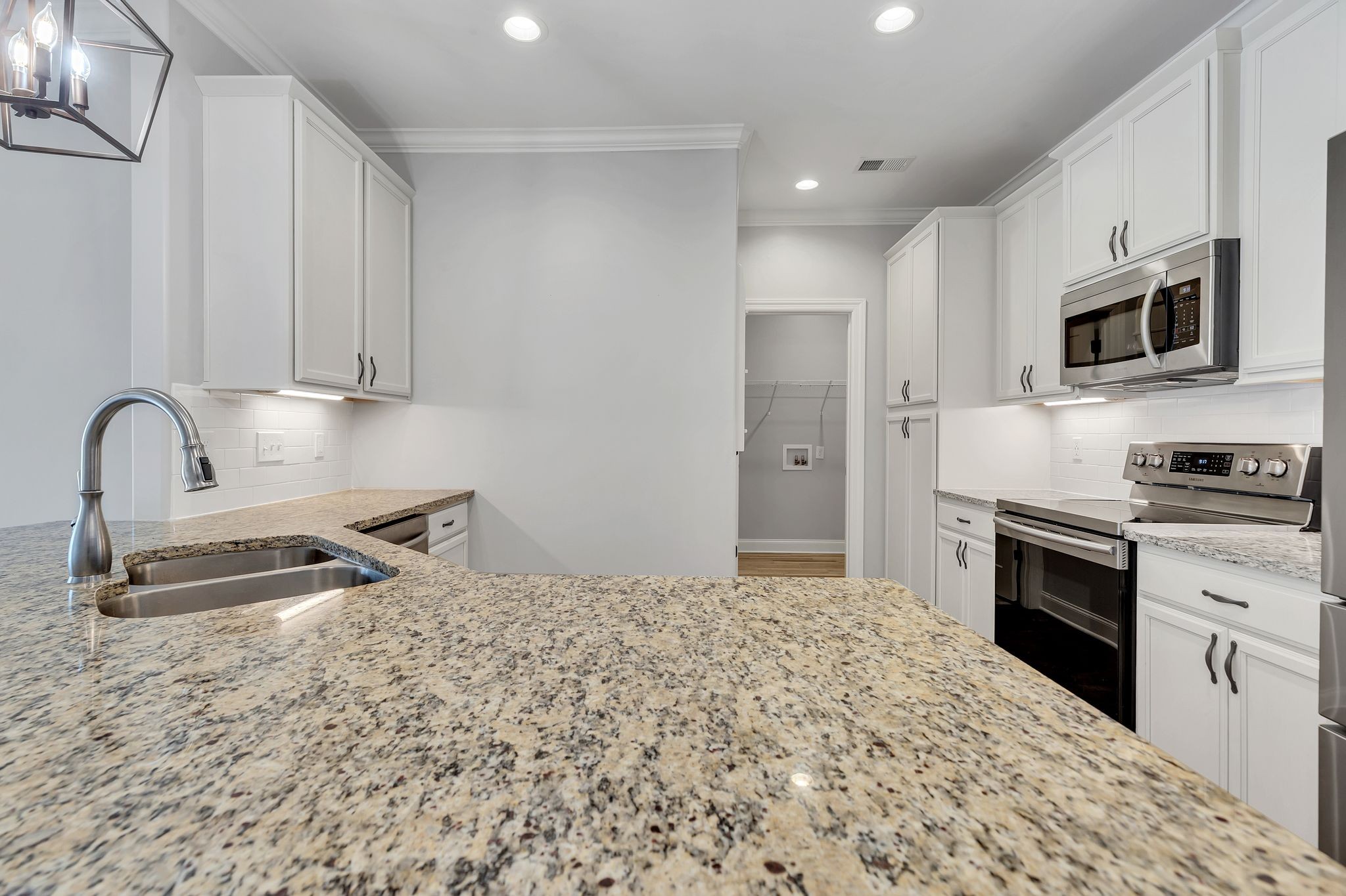 3508 Pershing Drive Murfreesboro, TN 37129 - Photo 12 of 38 a kitchen with stainless steel appliances granite countertop a sink stove and refrigerator
