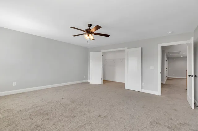 a view of a big room with carpet
