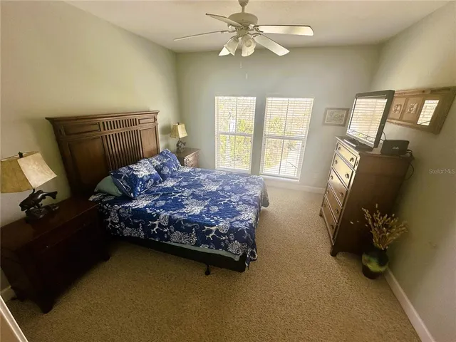 a bathroom with a double vanity sink a mirror and a shower