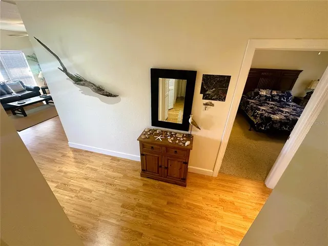 a view of a balcony with chairs