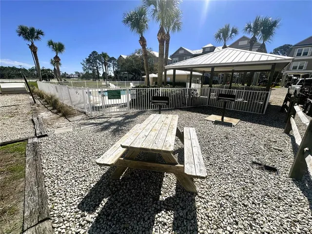a view of balcony with wooden floor