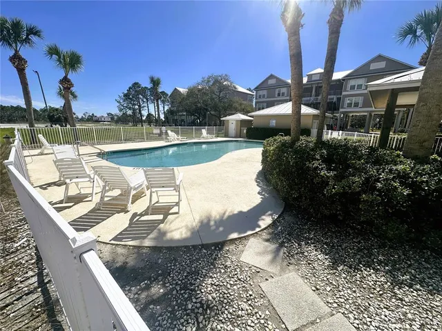a front view of a building and a yard