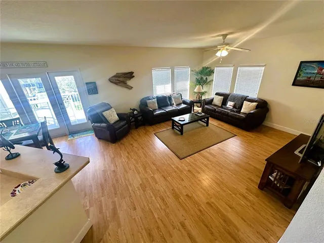 a living room with furniture rug and window