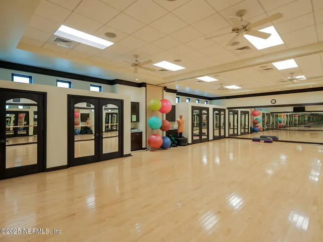 a front view of house with a garden
