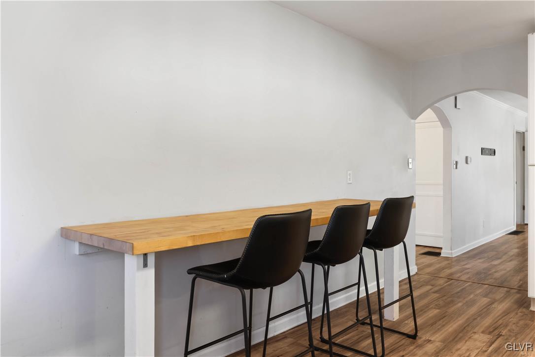 1802 Moselem Spring Road Hamburg, PA 19526 - Photo 16 of 50 a view of table and chairs in wooden floor