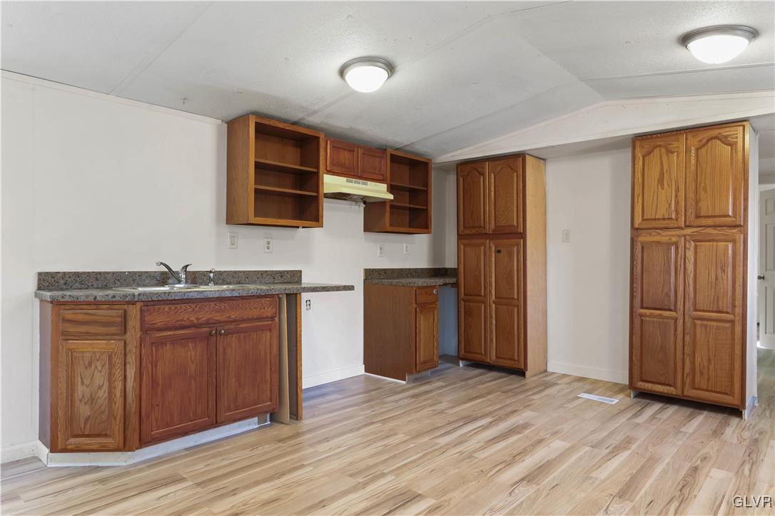 1802 Moselem Spring Road Hamburg, PA 19526 - Photo 34 of 50 a kitchen with stainless steel appliances granite countertop a refrigerator and a sink