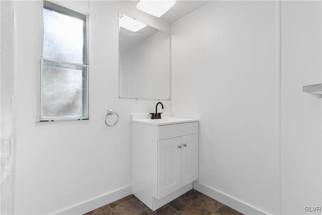 1802 Moselem Spring Road Hamburg, PA 19526 - Photo 38 of 50 a bathroom with a sink and a mirror