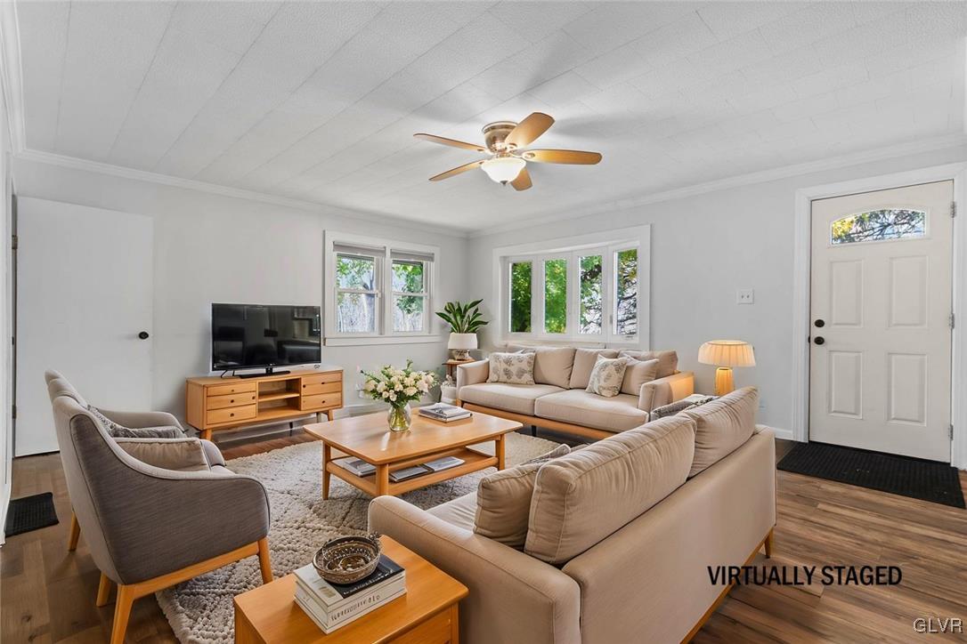 1802 Moselem Spring Road Hamburg, PA 19526 - Photo 9 of 50 a living room with furniture and a flat screen tv