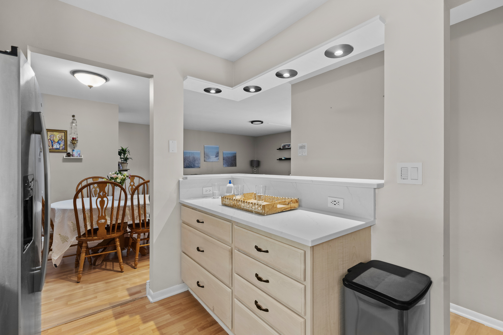 7353 Blackburn Avenue, Unit K206 Downers Grove, IL 60516 - Photo 8 of 24 a spacious bathroom with a granite countertop sink and a mirror