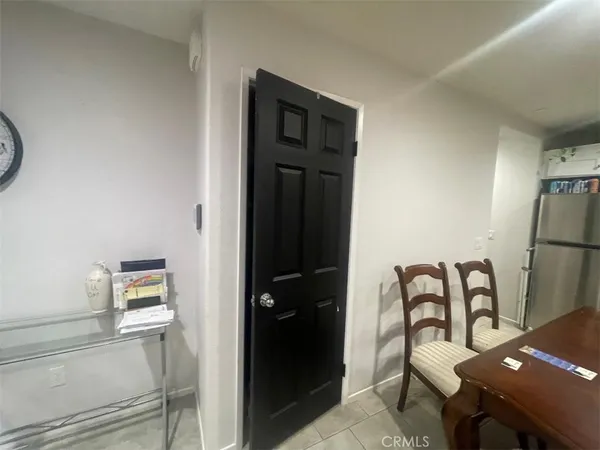 a view of a hallway with seating area