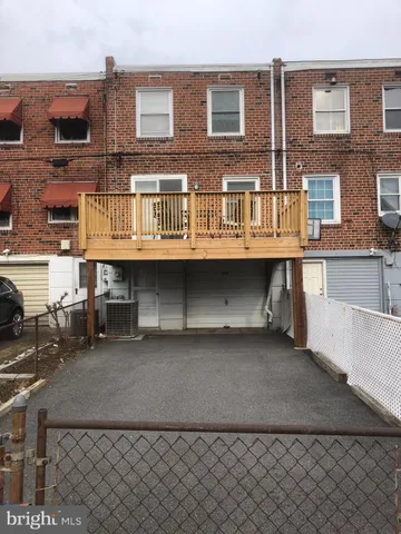 a front view of a building with glass windows