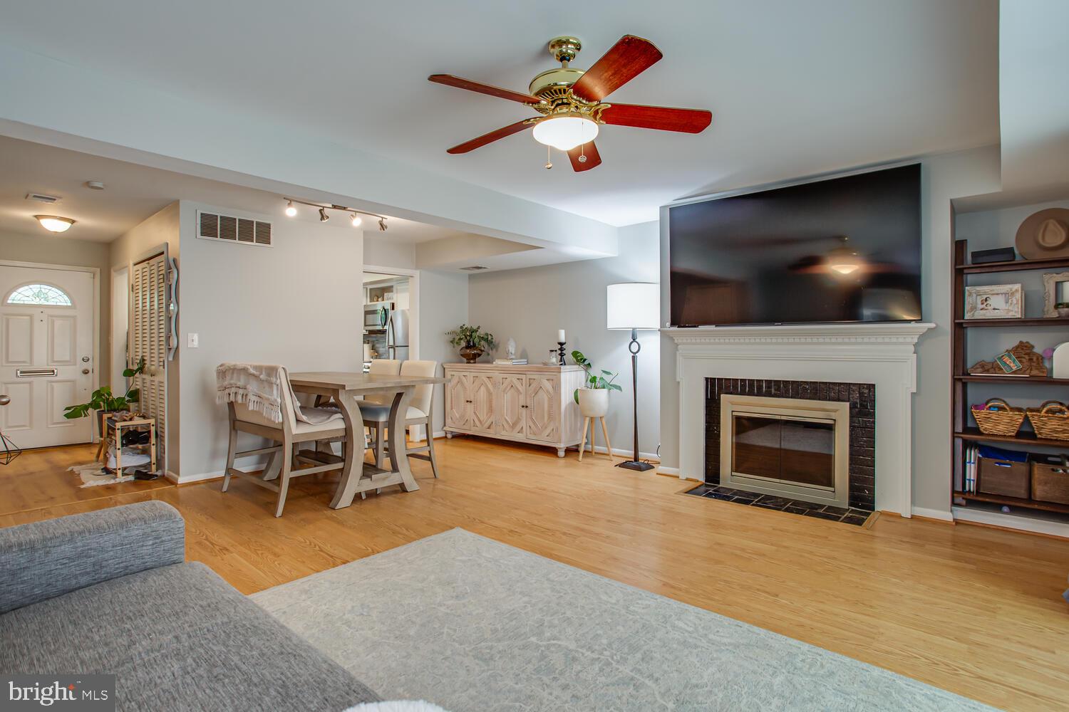7607 Tiverton Drive Springfield, VA 22152 - Photo 7 of 25 Roomy living room and dining with fireplace